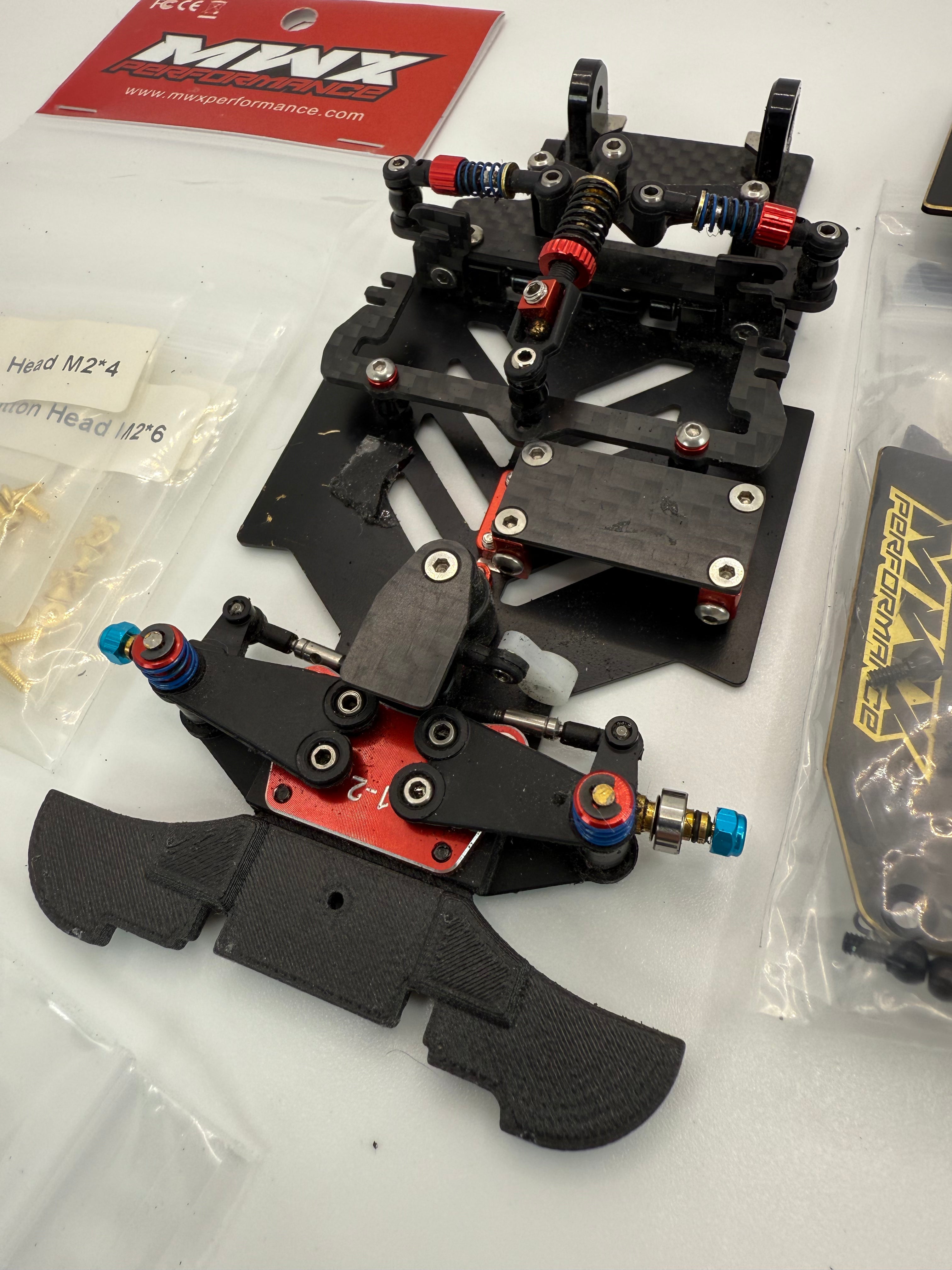 Price Drop! MWX 102mm pre owned chassis V1 with all upgrade parts for V2 conversion, brass chassis