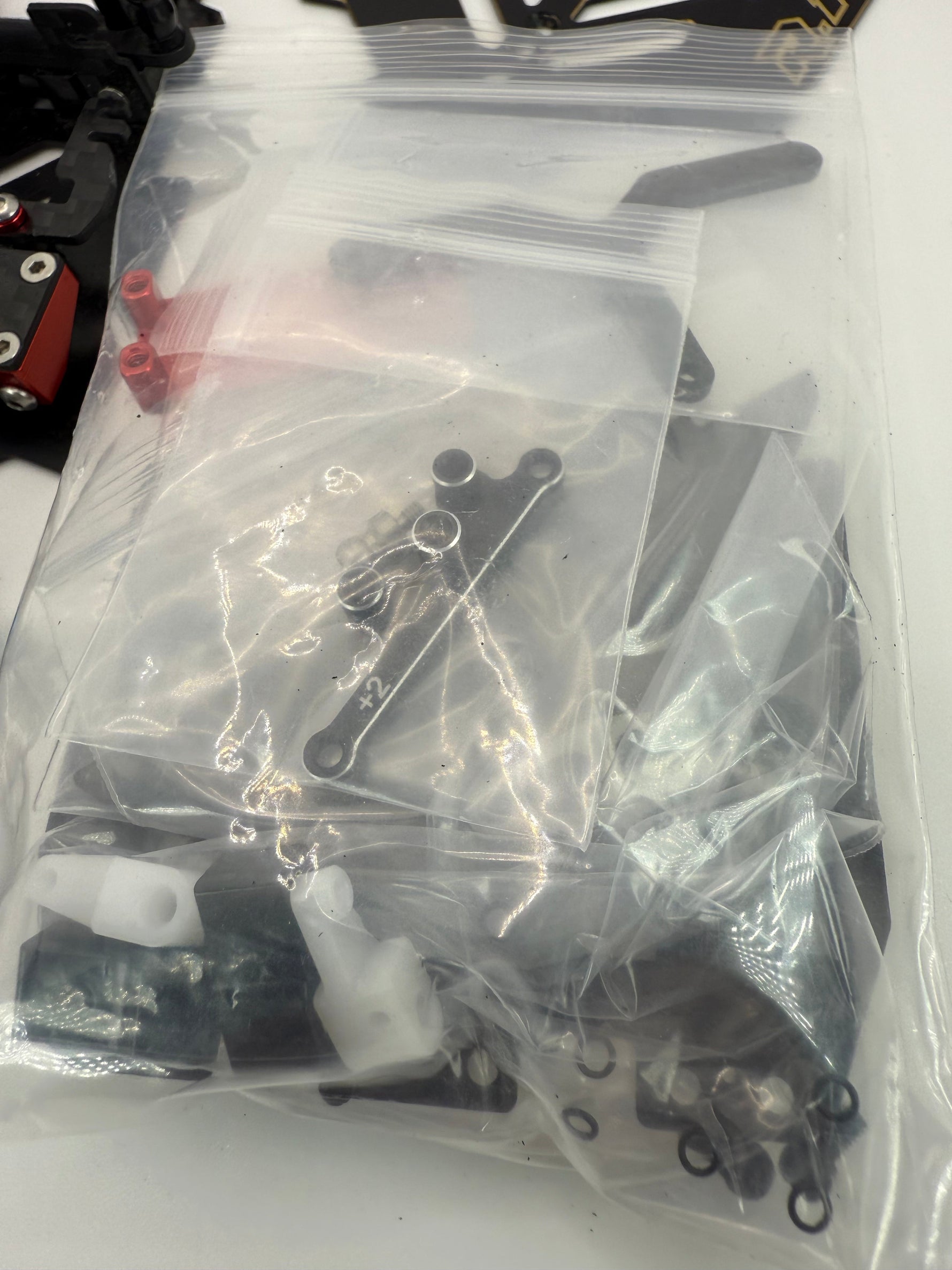 Price Drop! MWX 102mm pre owned chassis V1 with all upgrade parts for V2 conversion, brass chassis